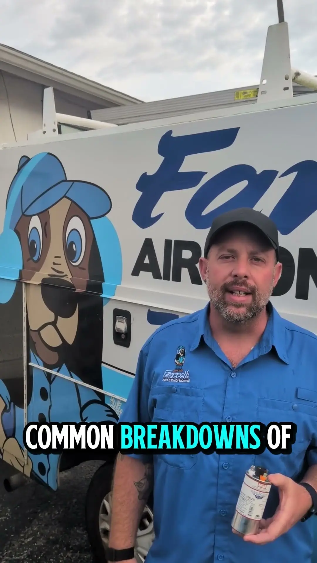 Goose from Farrell Air Conditioning holding an AC capacitor beside a Farrell service van in Port Richey