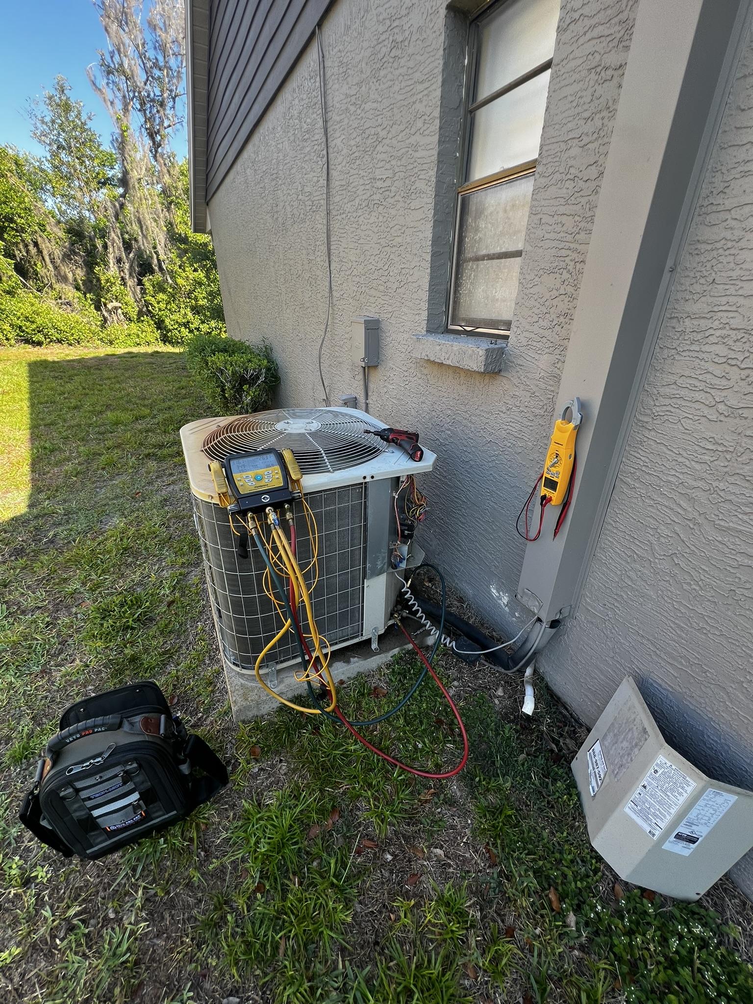 AC unit being repaired